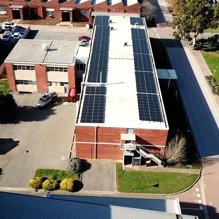Commercial rooftop solar array installed by Deionno Electrical
